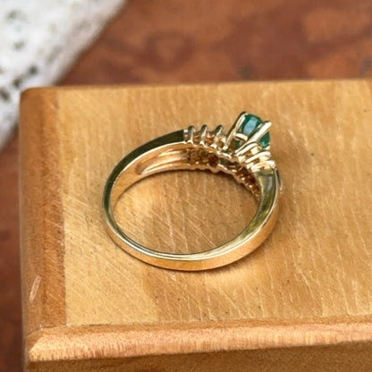 Estate 14KT Yellow Gold Oval Emerald + Round Diamond Ring