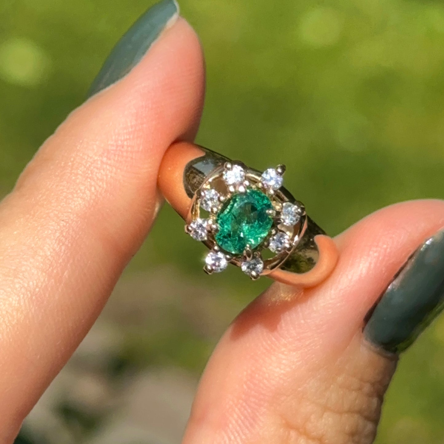 Estate 14KT Yellow Gold Oval Emerald + Diamond Halo Ring