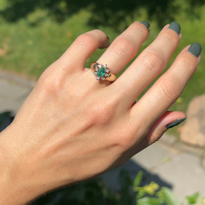 Estate 14KT Yellow Gold Oval Emerald + Diamond Halo Ring