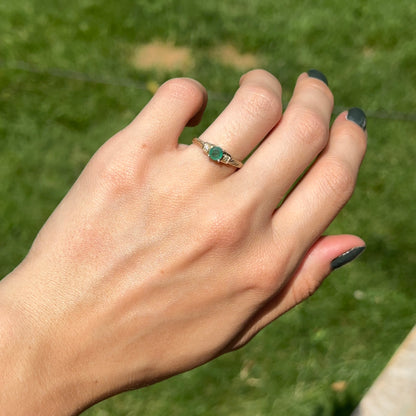 10KT Yellow Gold Round Emerald + Round Diamond Twisted Ring