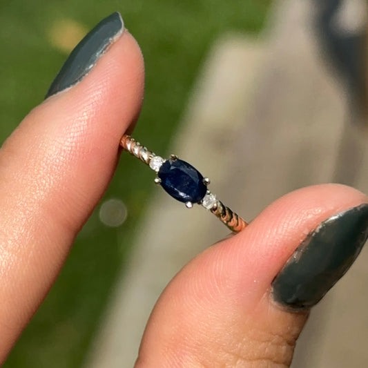 10KT Yellow Gold Oval Sapphire + Round Diamond Twisted Style Ring