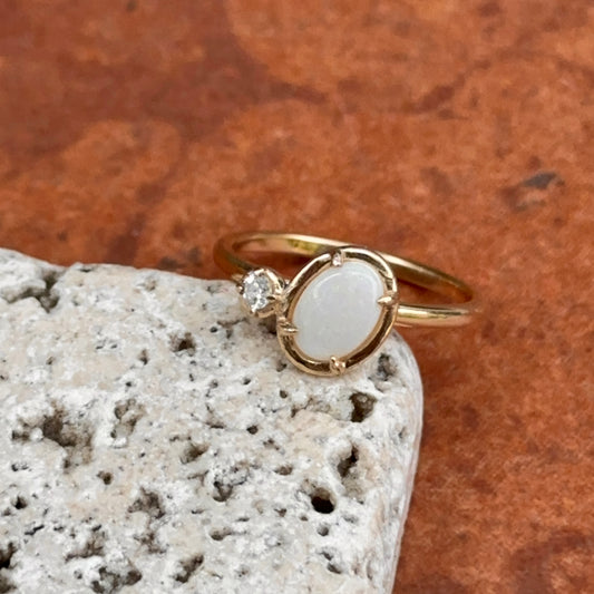 14KT Yellow Gold Oval White Opal + Round Diamond Off Set Ring