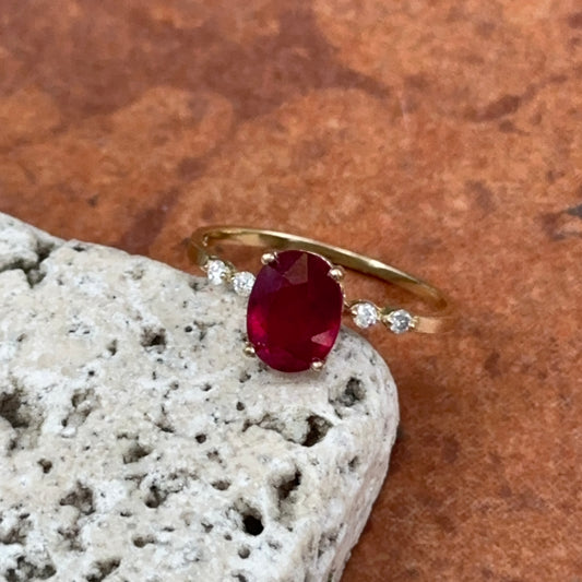 10KT Yellow Gold Oval Ruby + Round Diamond Ring