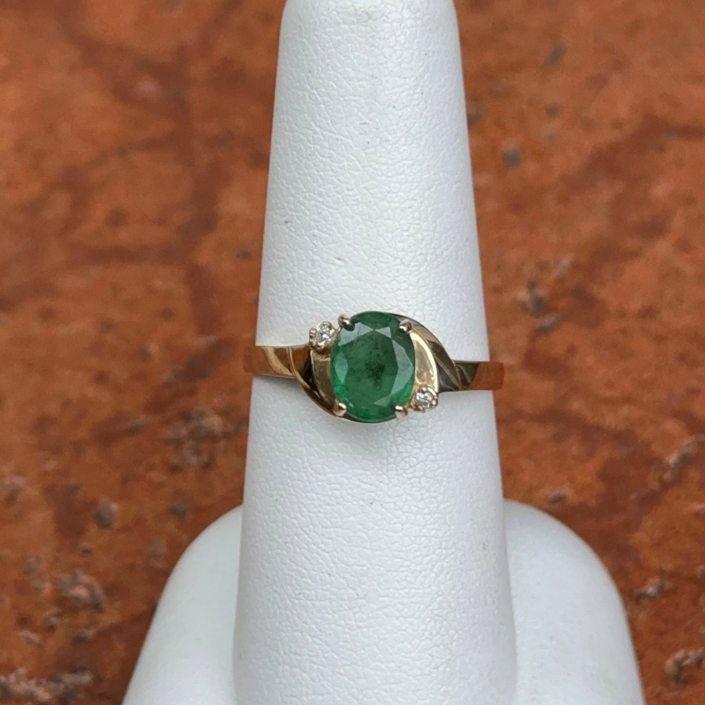 10KT Yellow Gold Oval Emerald + Round Diamond Abstract Ring