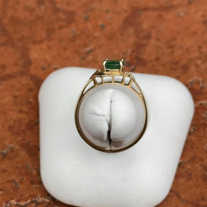 10KT Yellow Gold Oval Emerald + Round Diamond Abstract Ring