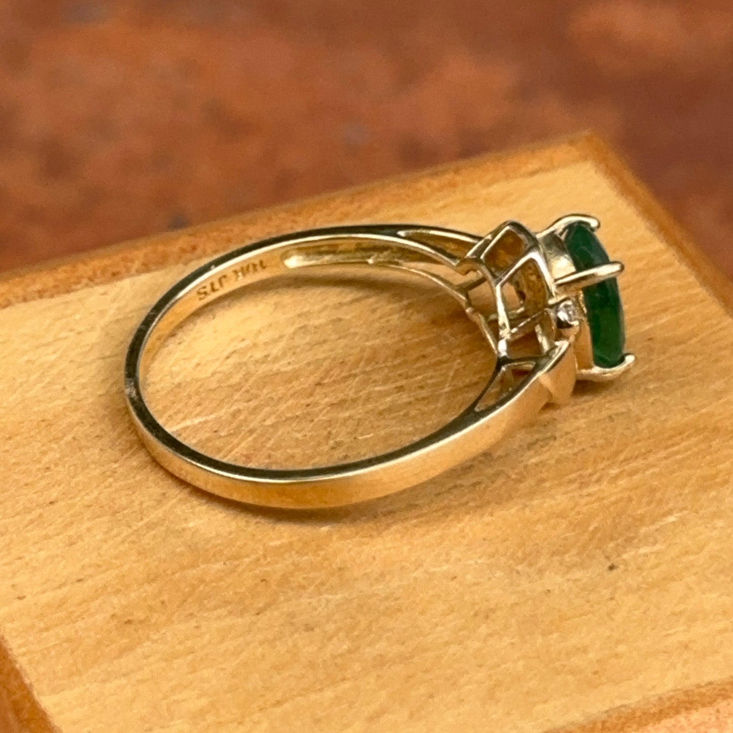 10KT Yellow Gold Oval Emerald + Round Diamond Abstract Ring