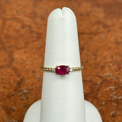 10KT Yellow Gold Oval Ruby + Round Diamond Twisted Design Ring