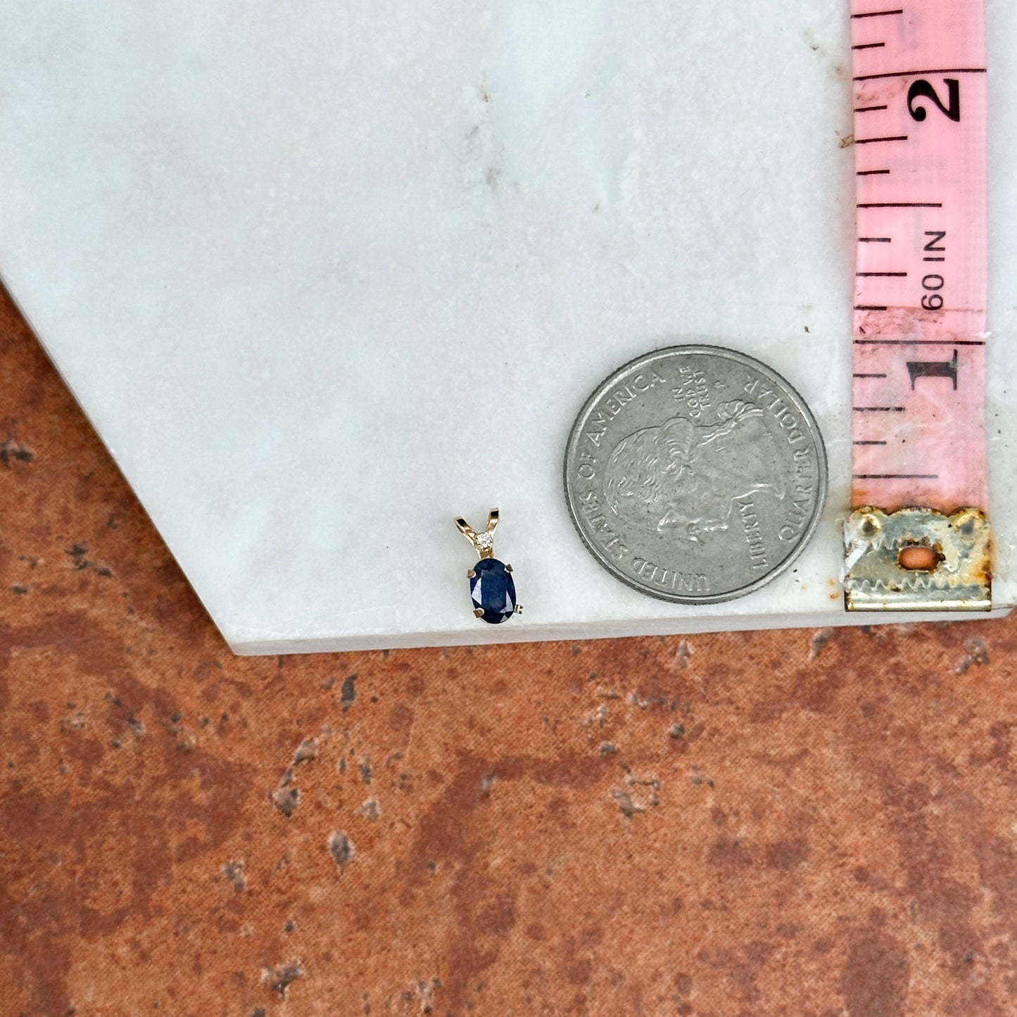 14KT Yellow Gold Oval Sapphire + Round Diamond Pendant