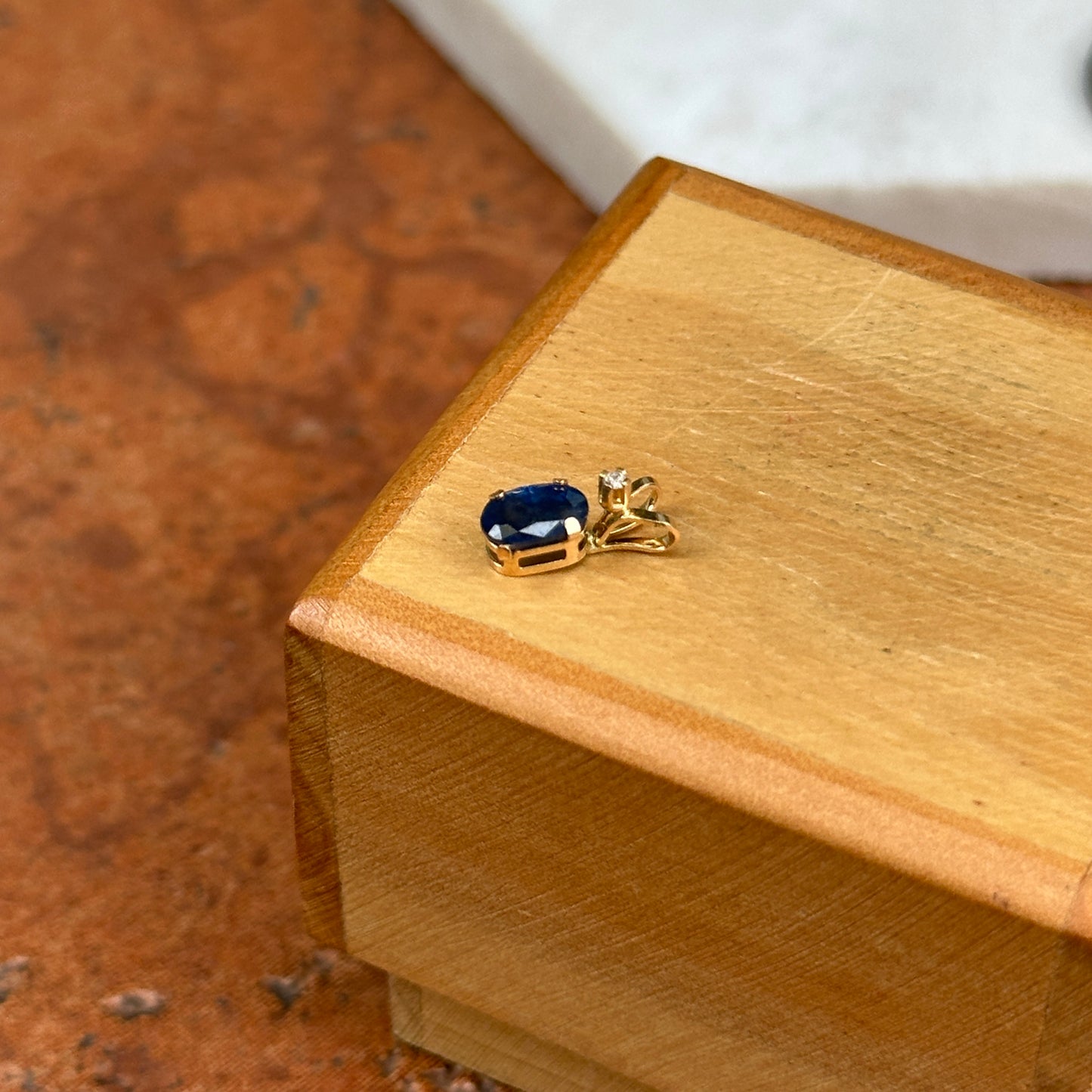 14KT Yellow Gold Oval Sapphire + Round Diamond Pendant