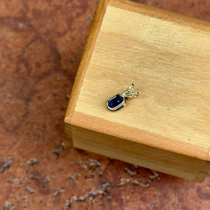 14KT Yellow Gold Oval Sapphire + Round Diamond Pendant