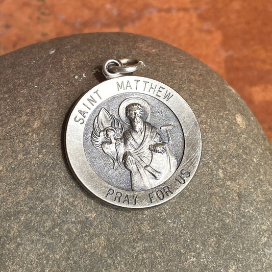 Sterling Silver Antiqued Saint Matthew Round Medal Pendant 31mm, Sterling Silver Antiqued Saint Matthew Round Medal Pendant 31mm - Legacy Saint Jewelry