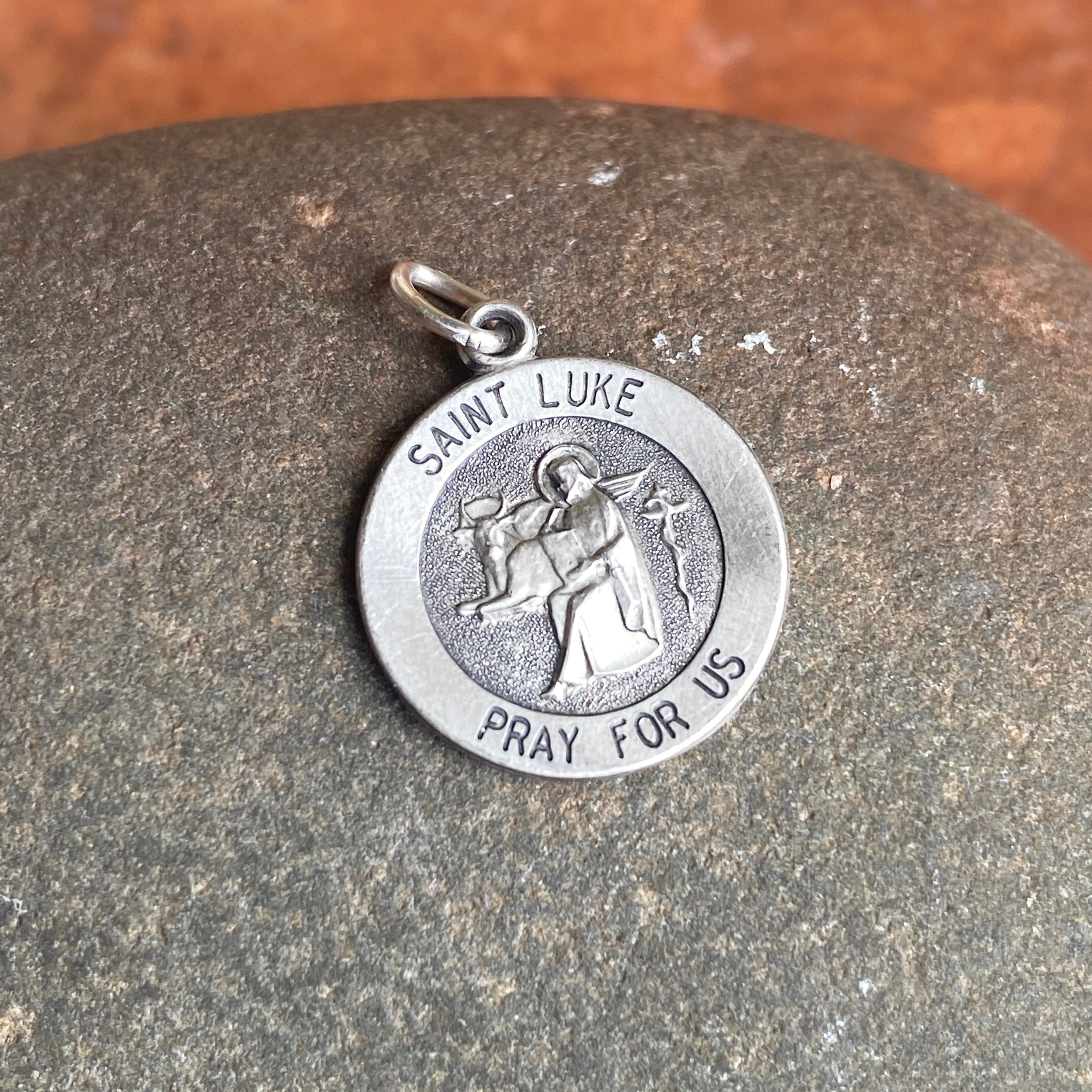 Saint Luke round 2024 medal-pendant.