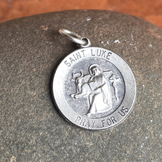 Sterling Silver Antiqued Saint Luke Medium Round Medal Pendant Charm, Sterling Silver Antiqued Saint Luke Medium Round Medal Pendant Charm - Legacy Saint Jewelry