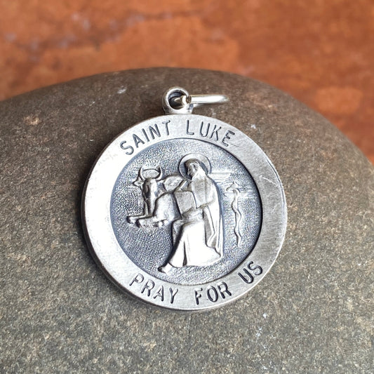 Sterling Silver Antiqued Saint Luke Large Round Medal Pendant Charm, Sterling Silver Antiqued Saint Luke Large Round Medal Pendant Charm - Legacy Saint Jewelry