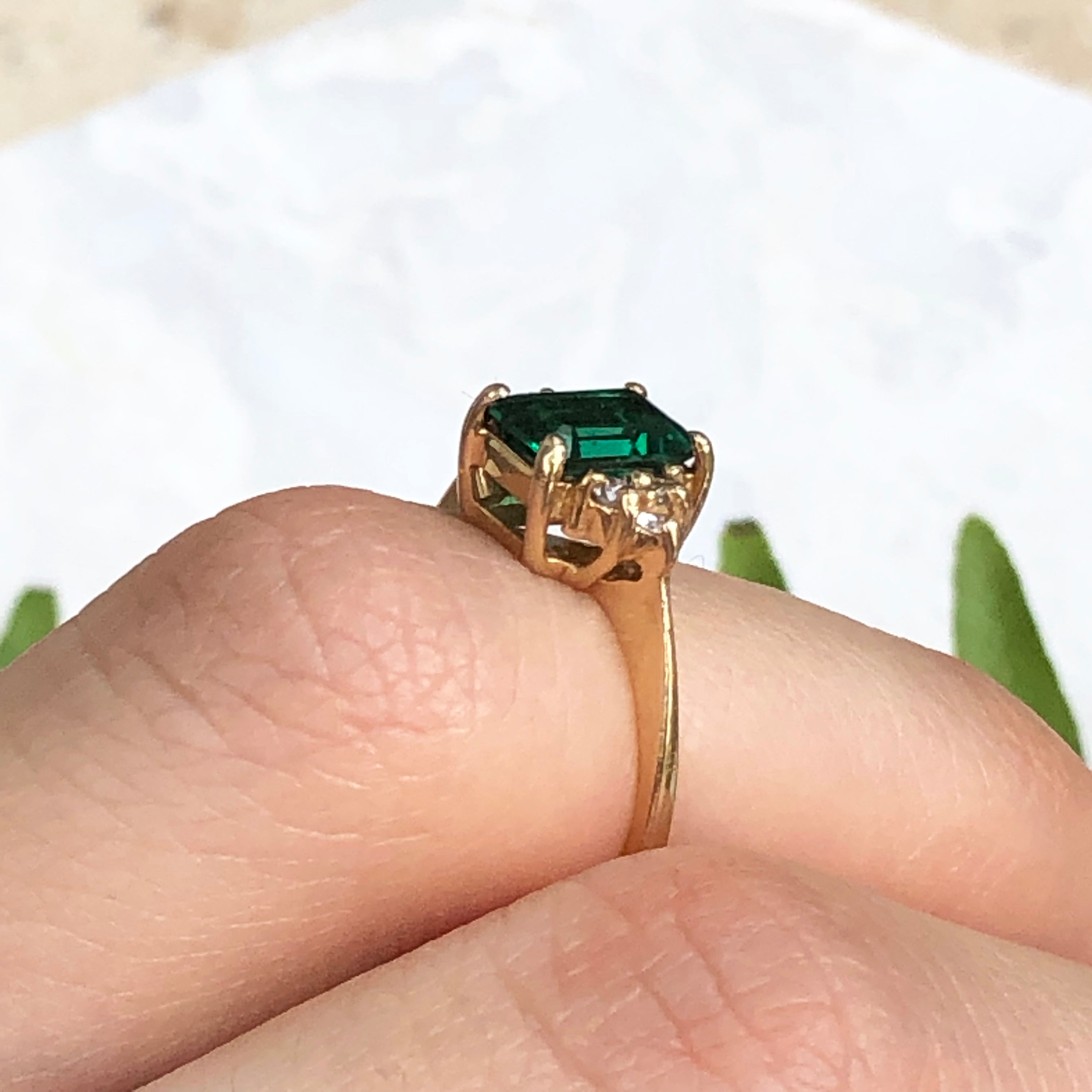 Emerald ring store with gold band