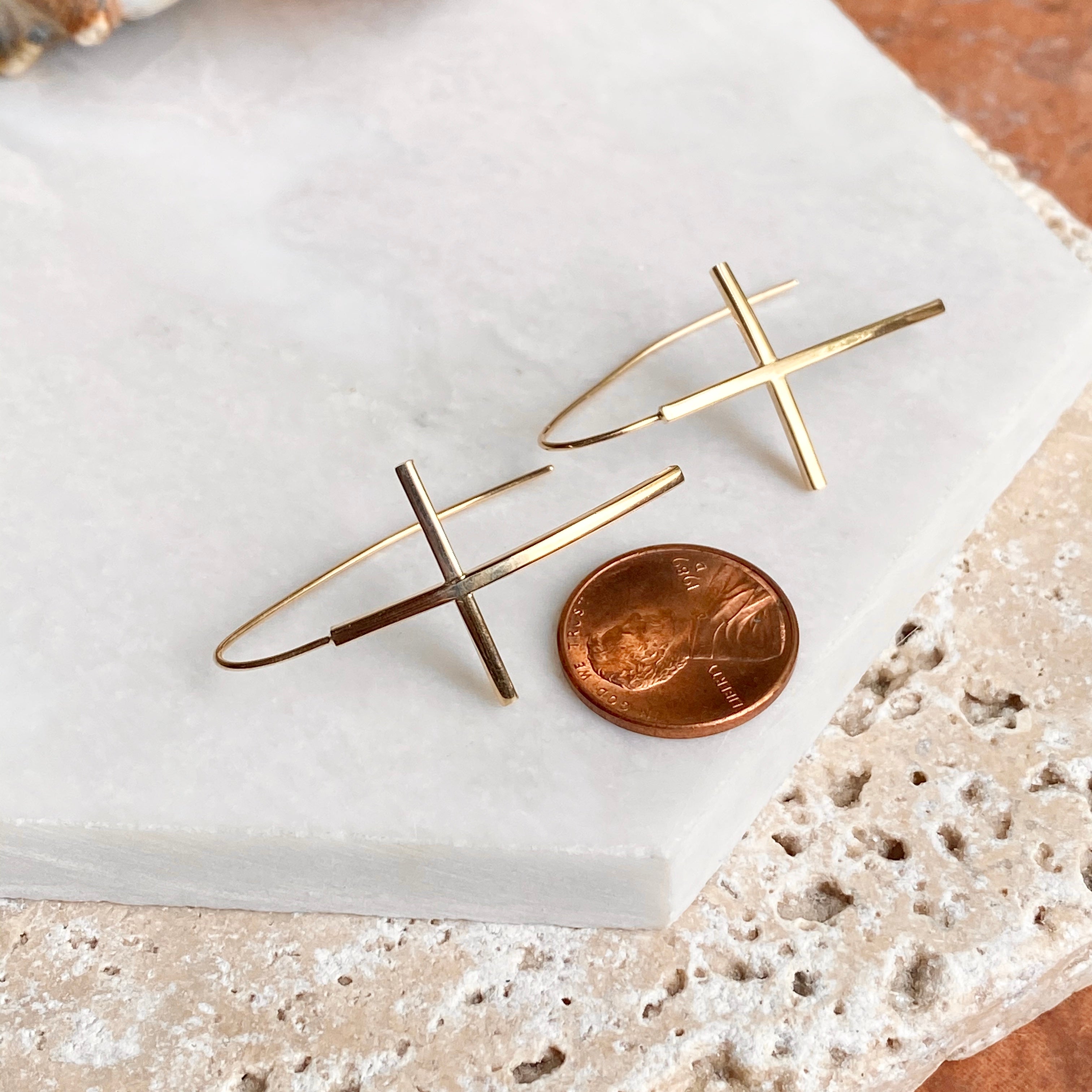 Gold cross on sale dangle earrings