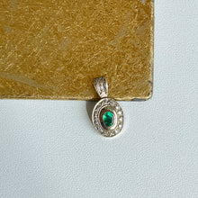 Load image into Gallery viewer, Estate 14KT White Gold Oval Emerald + Diamond Halo Pendant