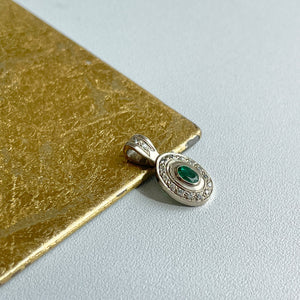 Estate 14KT White Gold Oval Emerald + Diamond Halo Pendant