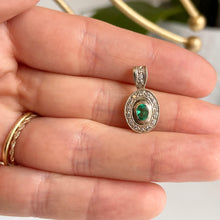 Load image into Gallery viewer, Estate 14KT White Gold Oval Emerald + Diamond Halo Pendant