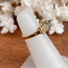 Load image into Gallery viewer, Estate 14KT Yellow Gold Oval Blue Topaz + 1/4 CT Diamond Accent Ring