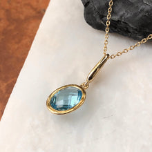 Load image into Gallery viewer, 14KT Yellow Gold Oval Blue Topaz Omega Pendant, 14KT Yellow Gold Oval Blue Topaz Omega Pendant - Legacy Saint Jewelry