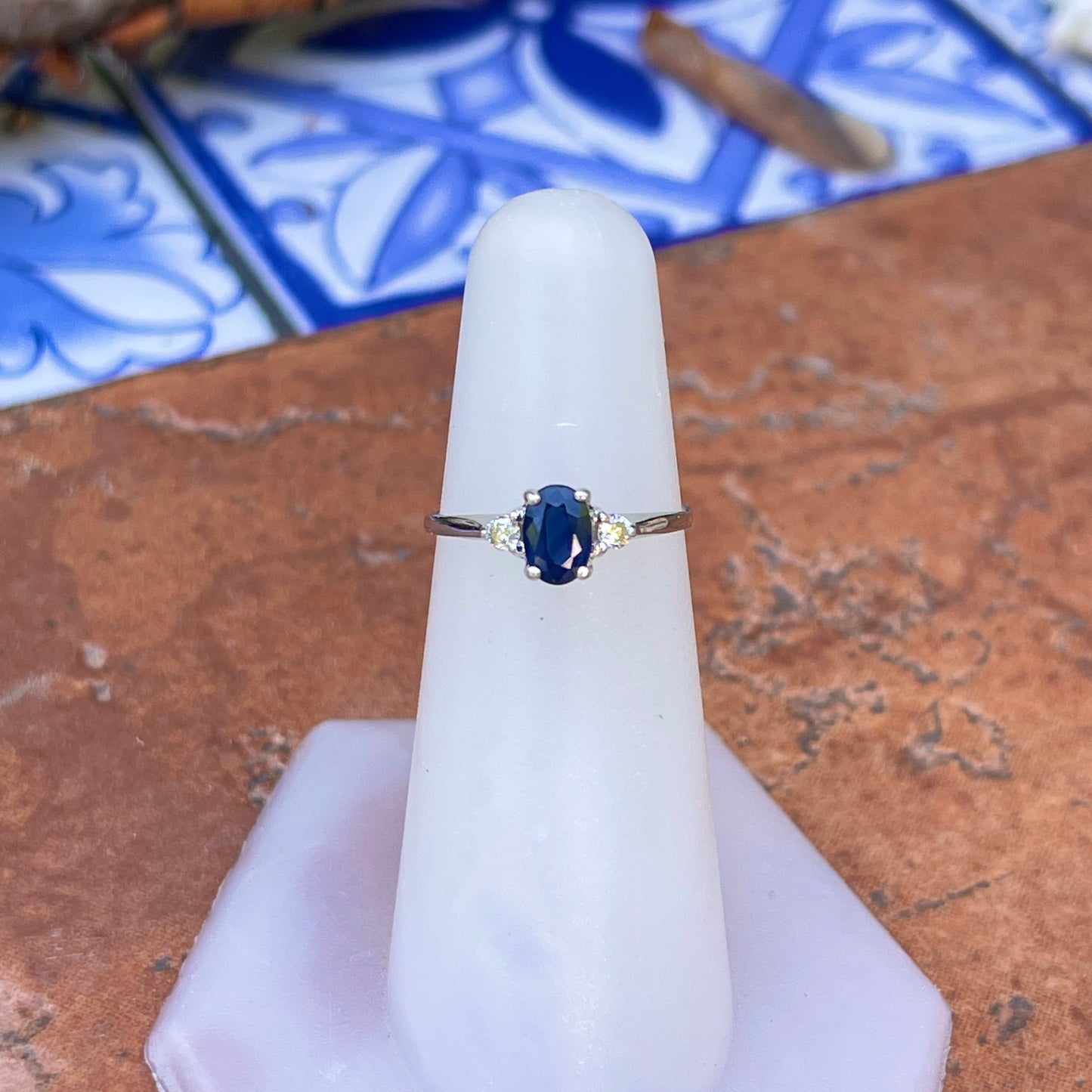 Platinum Oval .75 CT Blue Sapphire + Round Diamond Accent Ring