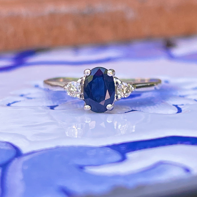 Platinum Oval .75 CT Blue Sapphire + Round Diamond Accent Ring