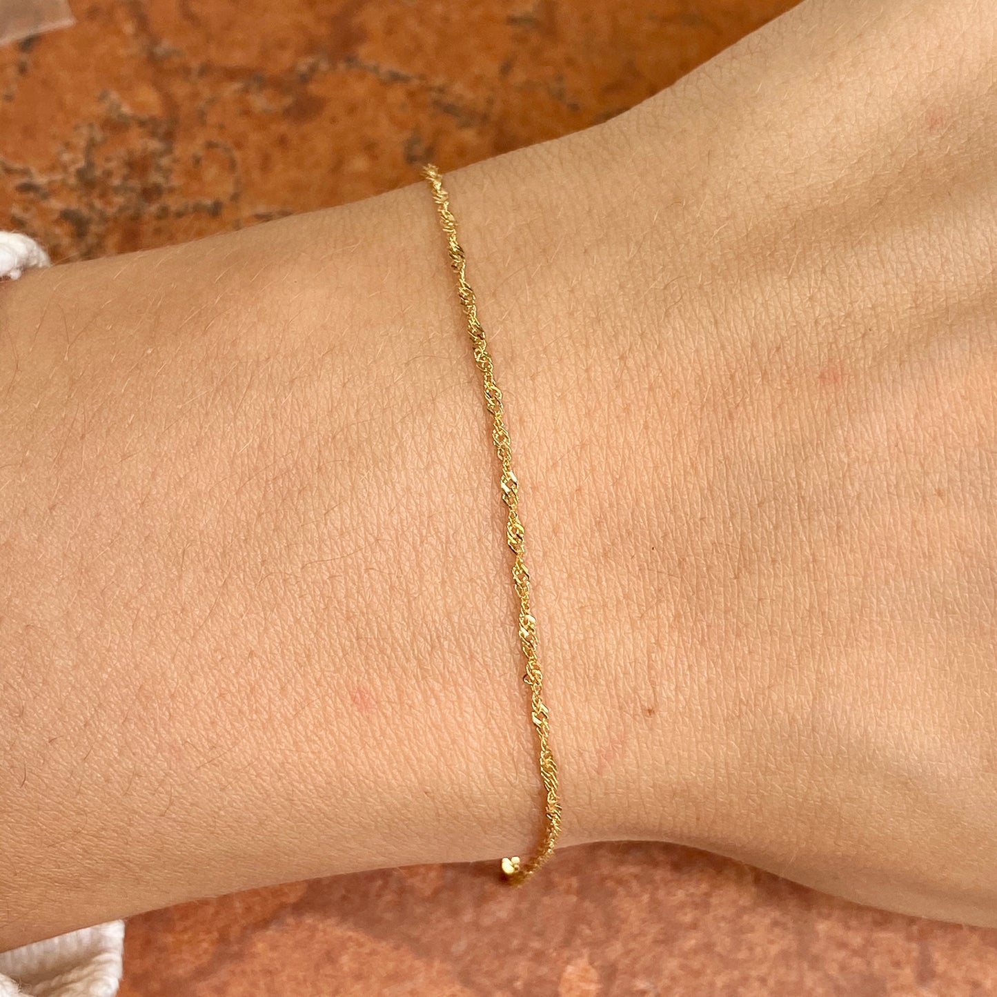 14KT Yellow Gold 1.1mm Singapore Link Thin Chain Bracelet 7"