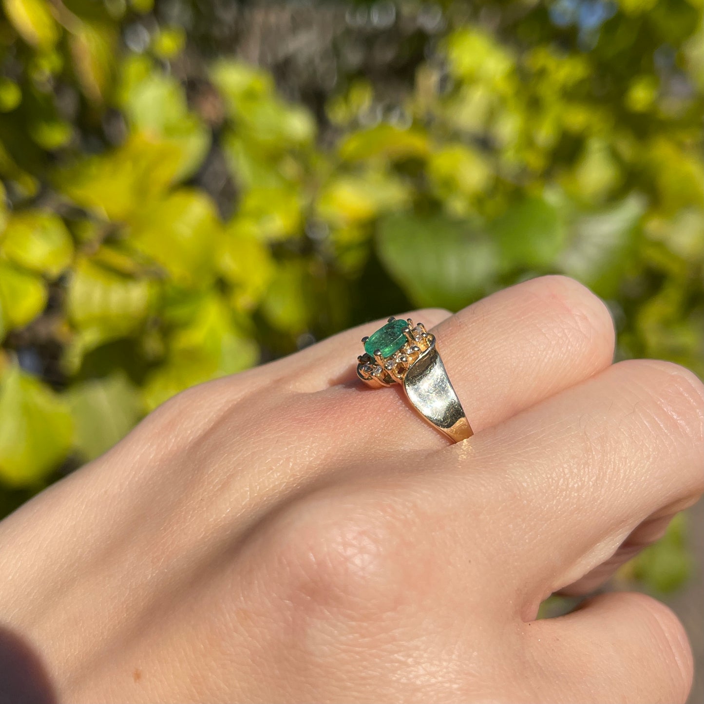 Estate 14KT Yellow Gold Oval .65 Carat Emerald + Diamond Halo Concave Ring