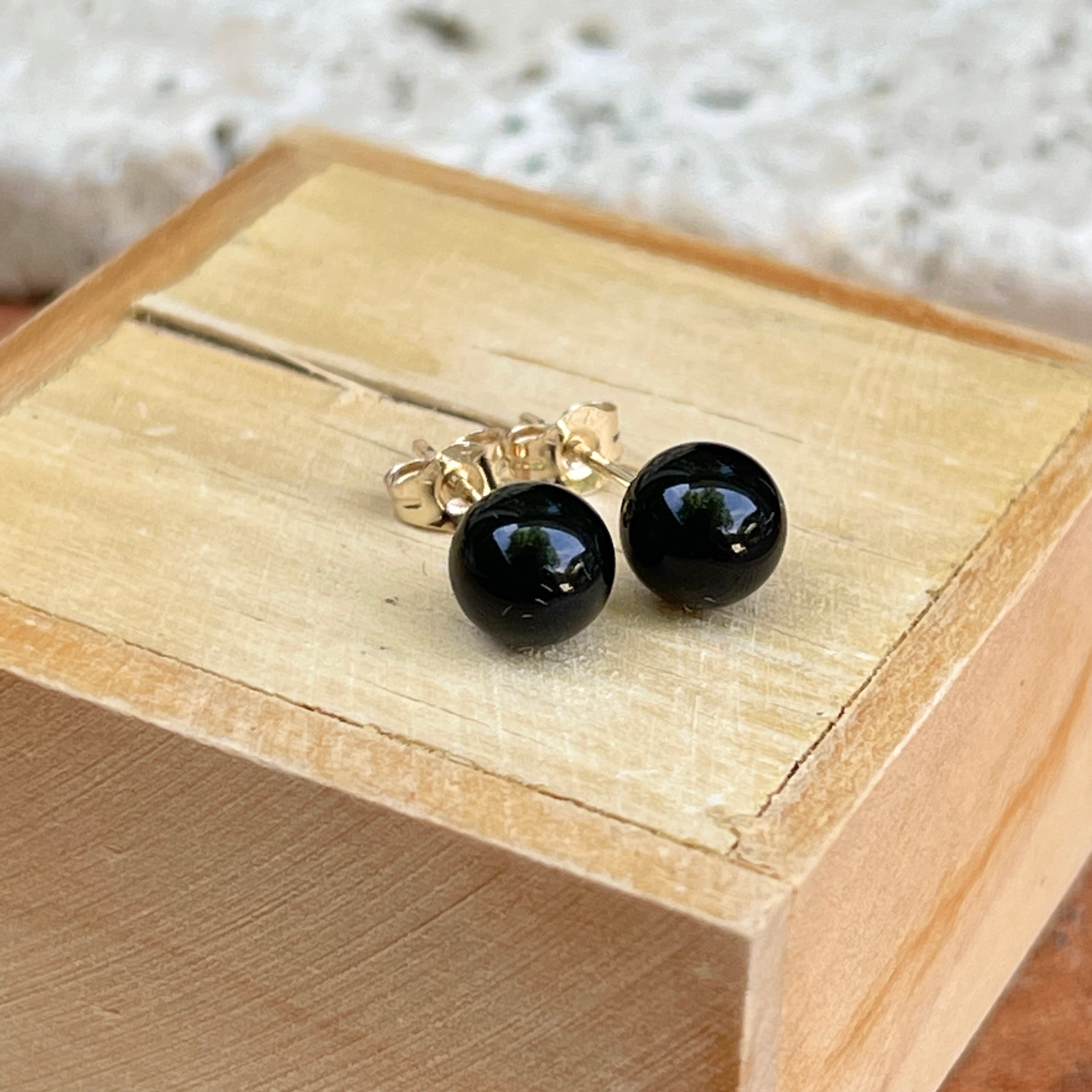 Black ball deals stud earrings