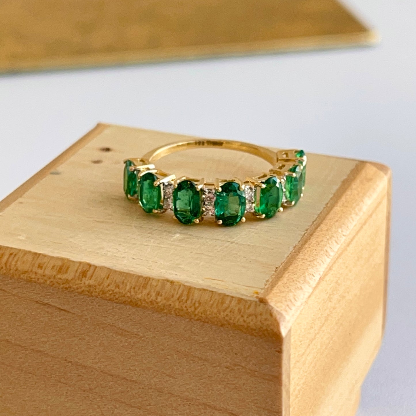 18KT Yellow Gold Oval Emerald + Diamond Half-Eternity Band Ring