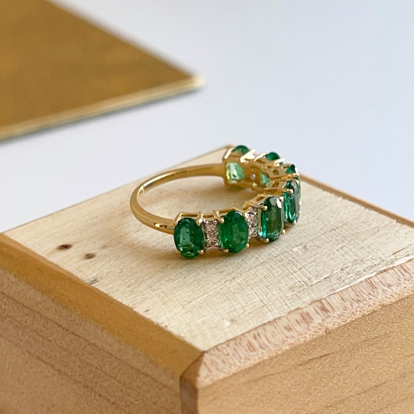 18KT Yellow Gold Oval Emerald + Diamond Half-Eternity Band Ring