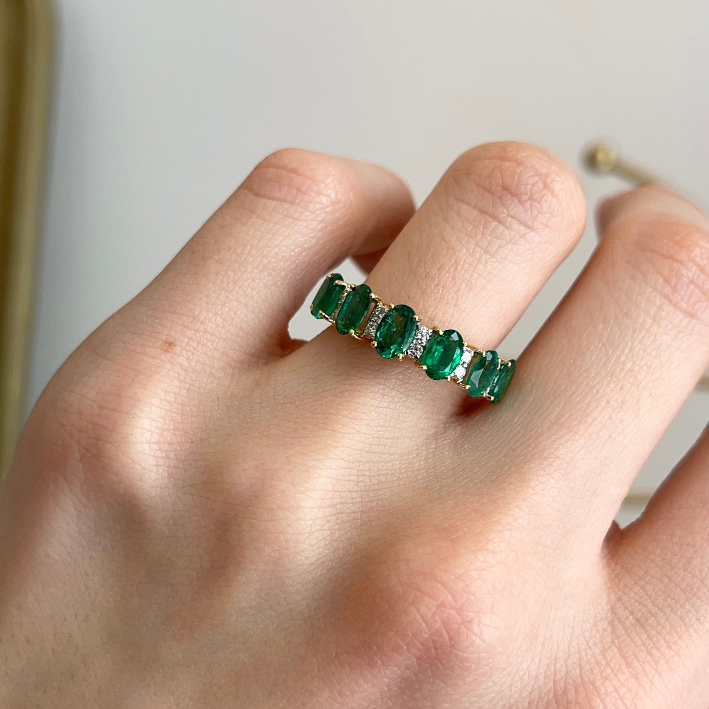 18KT Yellow Gold Oval Emerald + Diamond Half-Eternity Band Ring